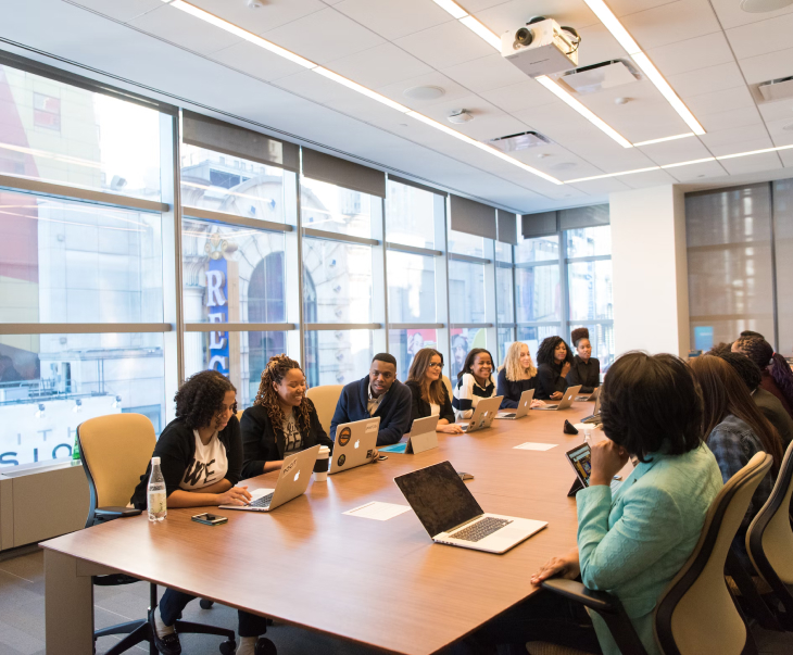 People gathered around a conference table