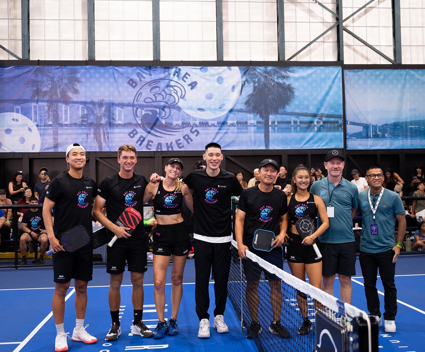 Players line up at the net at DINKsanity, a celebrity pickleball event NextShark produced with the Bay Area Breakers, with tennis Hall of Famer Michael Chang center